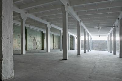 Picture of large old building with fresh complete concrete floor